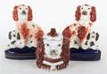 Three Porcelain Figures of Spaniels