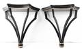 A Pair of Regency Style Black and Gilt Wall Brackets
