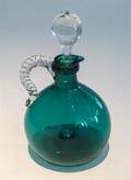 A Green Glass Decanter with Stopper