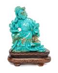 A Chinese Carved Turquoise Figure of a Female Immortal