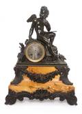 A Continental Bronze and Marble Figural Clock