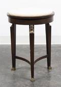 An Empire Style Gilt Metal Mounted Mahogany Table