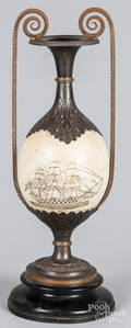 Copper and ostrich egg table lamp with scrimshaw decoration of a British ship