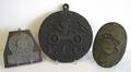 Two cast iron firemarks and a cast lead firemark ca 1765
