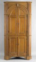 Pennsylvania onepiece pine architectural corner cupboard ca 1800