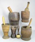Five carved and turned mortar and pestles 19th c
