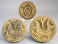 Three carved buttermolds early 19th c