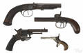Four antique revolvers