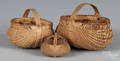 Three intricately woven split baskets
