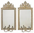 Pair of pierced brass mirrored sconces
