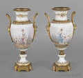 Pair of ormolu mounted porcelain urns