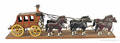 Carved and painted horse drawn stage coach