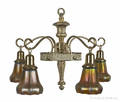 Hanging brass chandelier with five Steuben aurene glass shades