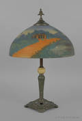 Artcraft Iron Works table lamp with a reverse painted shade
