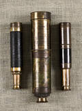 Three brass spyglasses