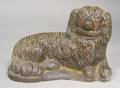 Ohio sewer tile figure of a recumbent spaniel late 19th c