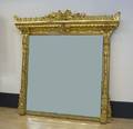 Massive Victorian gilded over mantle mirror