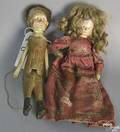 Two carved and articulated dolls