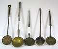 Five wrought iron copper and brass skimmers and ladles early 19th c