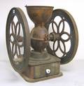Cast iron coffee grinder impressed Enterprise Manufacturing Co