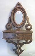 Carved and painted hanging shaving mirror