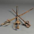 Two Model 1860 Staff  Field Officers Swords and a Miniature Cavalry Sabre