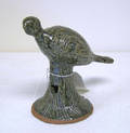 Cleater Meaders stoneware bird on stump