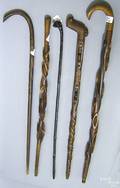 Five carved canes