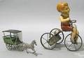 Boy on tricycle windup toy