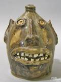 Contemporary southern grotesque face jug