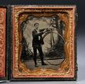 Sixthplate Tintype of Man with a High Wheel Bicycle