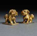 Pair of Miniature Giltbronze Foo Lions