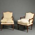 Pair of Louis XVstyle Walnut Fauteuils