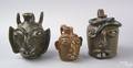 Three North Carolina stoneware grotesque jugs
