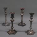 Set of Four English Weighted Silverplated Candlesticks