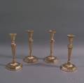 Set of Four Barker Brothers Classical Revival Silverplated Candlesticks