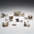 Eight Small Silver Figural Groups