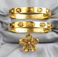 Pair of 14kt Gold and Citrine Bracelets