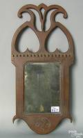 Carved and painted folk art mirror