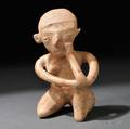 Chinesco Seated Female Figure