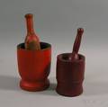 Two Redpainted Turned Mortars and Pestles