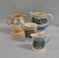 Four Mostly Mochaware Vessels