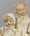 Two Small Bisque Head Baby Dolls
