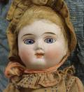 Small Closed Mouth Bisque Head Doll