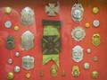 Framed Group of Twentynine Firefighting Badges Buttons and Pins