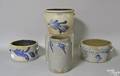 Four pcs of stoneware with blue decoration to include one crock with blue tulip