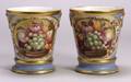 Pair of Porcelain Cache Pots and Stands