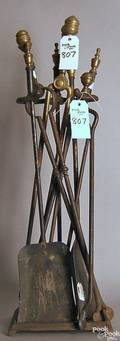 Group of brass and iron fireplace tools