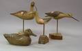 Three Carved and Painted Wooden Shorebird Decoys and a Duck Decoy
