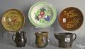 Six pieces of redware and pottery table articles to include creamer